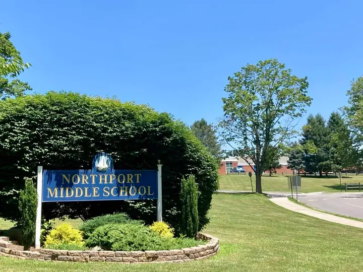 Northport Middle School custodian charged with 13 counts of criminal weapon possession