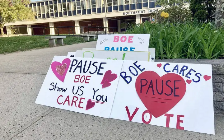 Residents rally for a pause on schools closures; others speak in support of redistricting