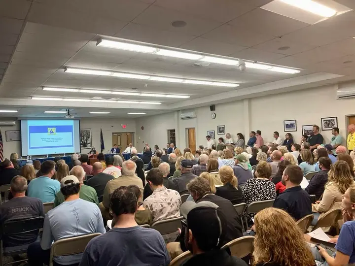 Overflowed BOE meeting adjourned after chaos erupts; reports of threats lead to police on scene