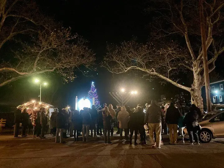 Lighting of the menorah a joyous celebration in Northport Village