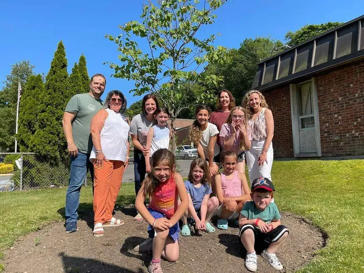 NNGI donates Eastern redbud tree to Northport Village Hall